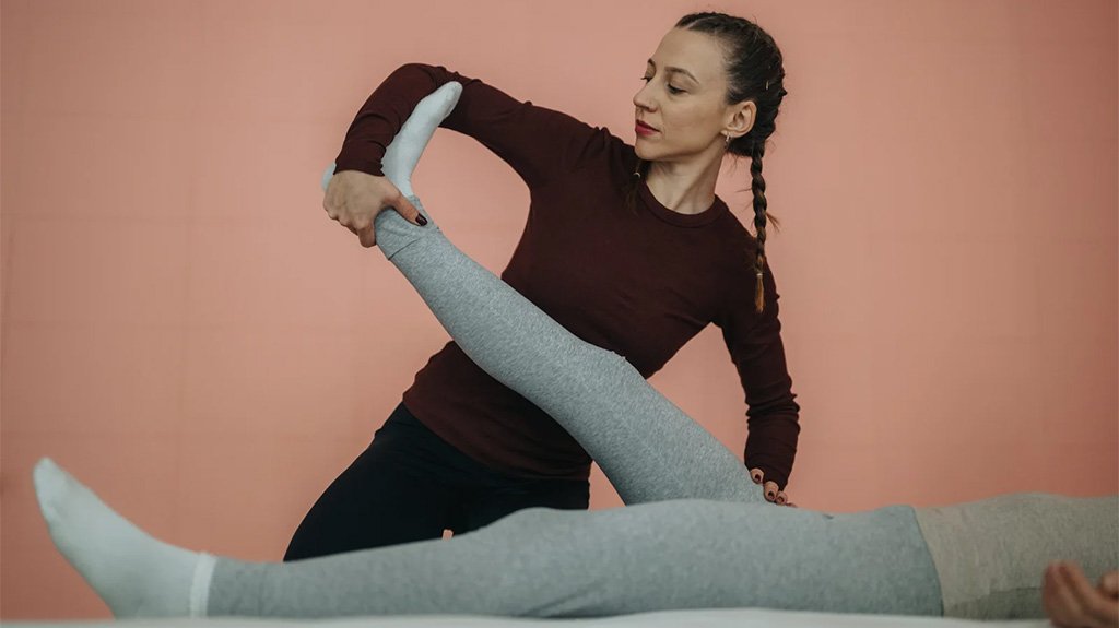 The Benefits of Assisted Stretching: Why You Need More Than Just Yoga